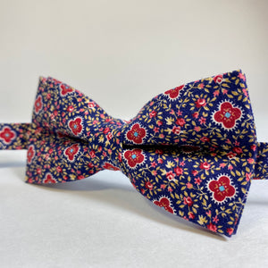 
                  
                    1990's Floral Print Bow Tie
                  
                